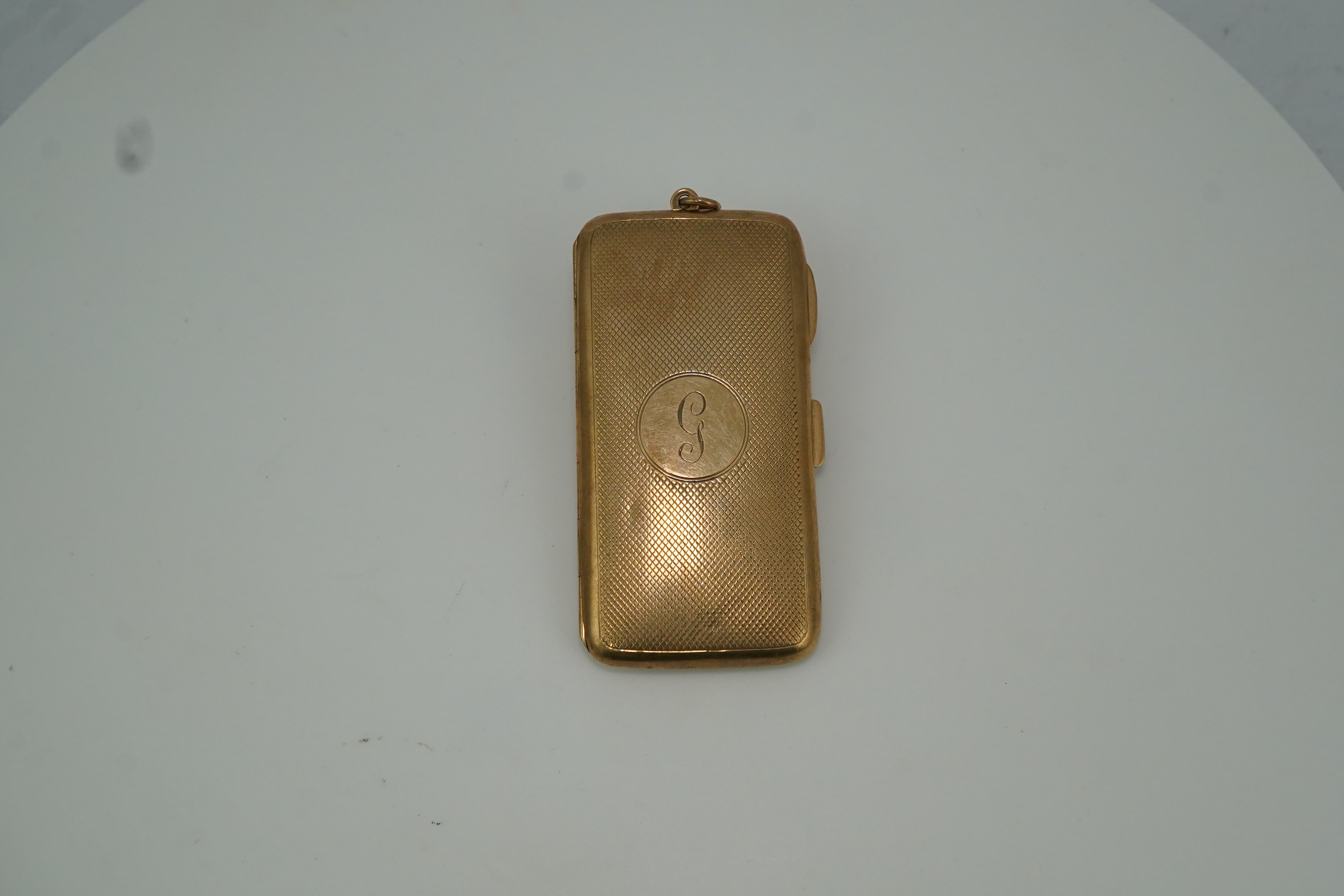 A George V 9ct gold cigarette case, circa 1919